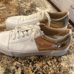 Marc Fisher ladies shoes. Size 9.5. White with shiny gold on the heel.